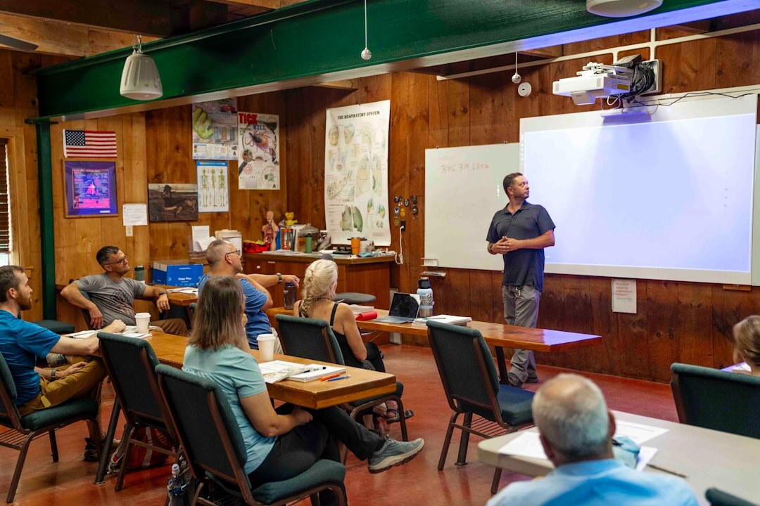 Trainer presenting to a group in a workshop