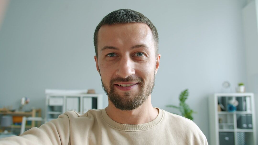 Portrait of a young man content creator smiling